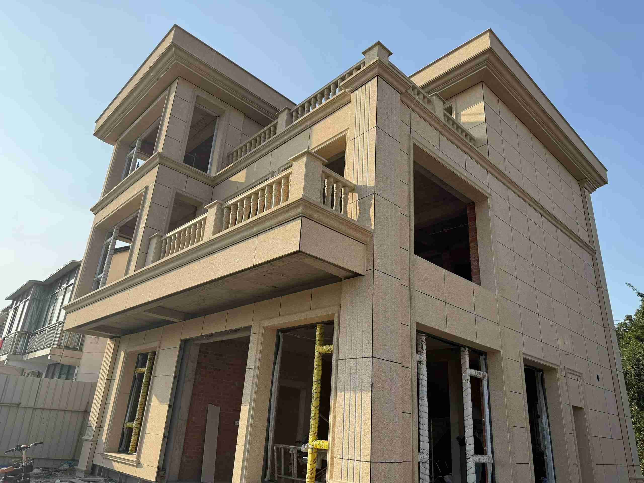 锦州 黄金麻花岗岩石材荔枝面外墙干挂效果展示